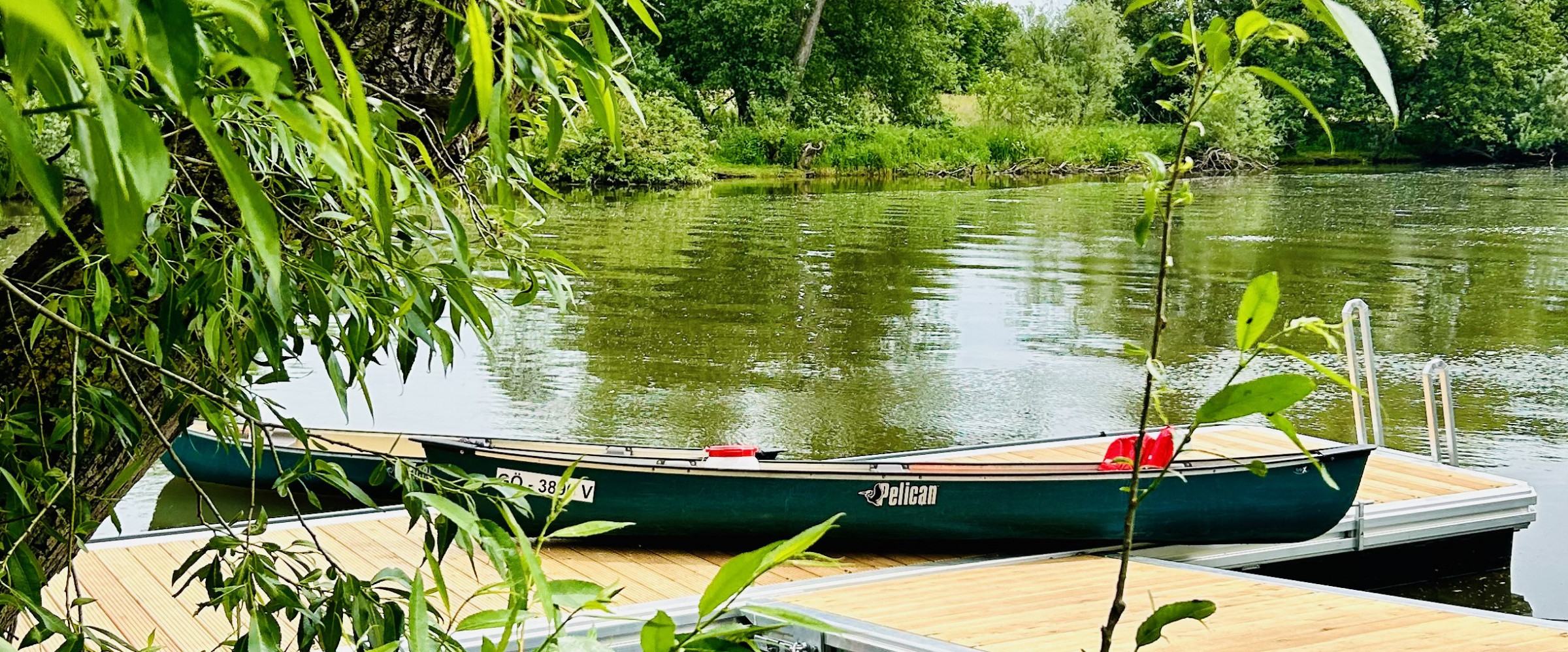 Boat dock on the Fulda River near the Kassel campsite – ideal for water sports activities