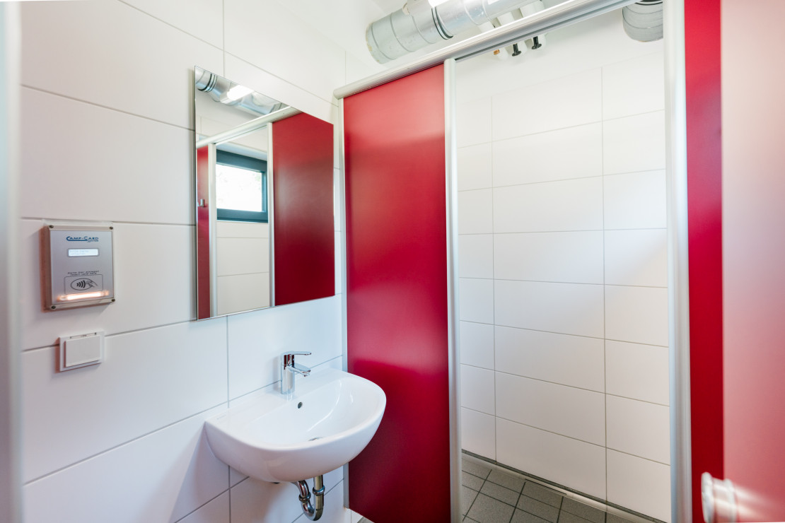 Modern and clean shower cabin in the functional building of the Kassel campsite